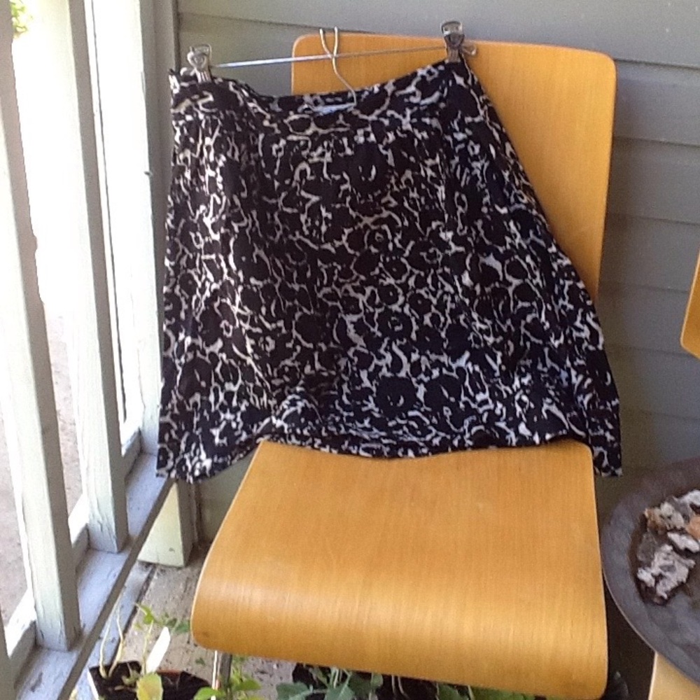Fall black floral skirt. So cute with boots!